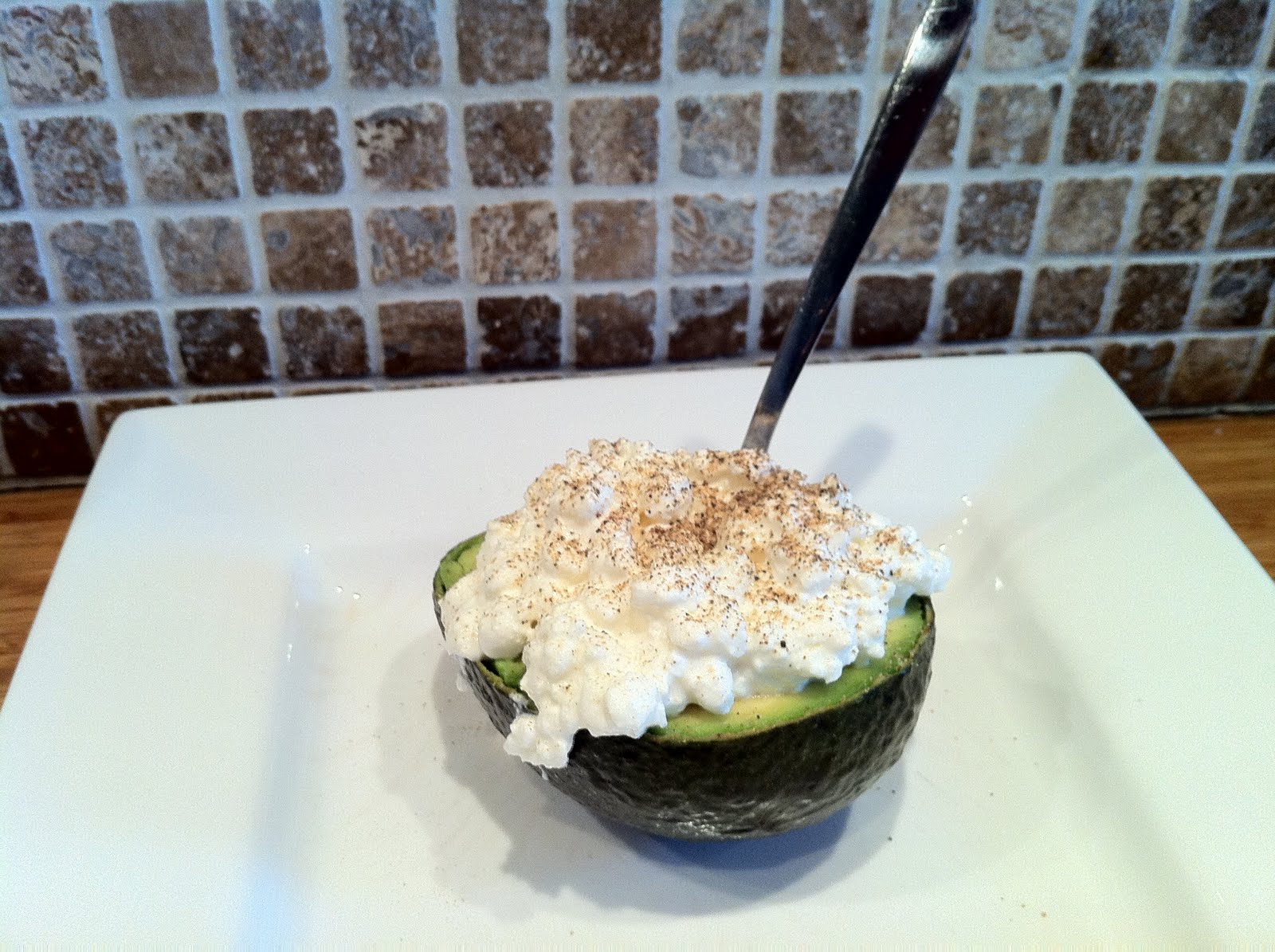 Food Devil Avocado with cottage cheese & black pepper