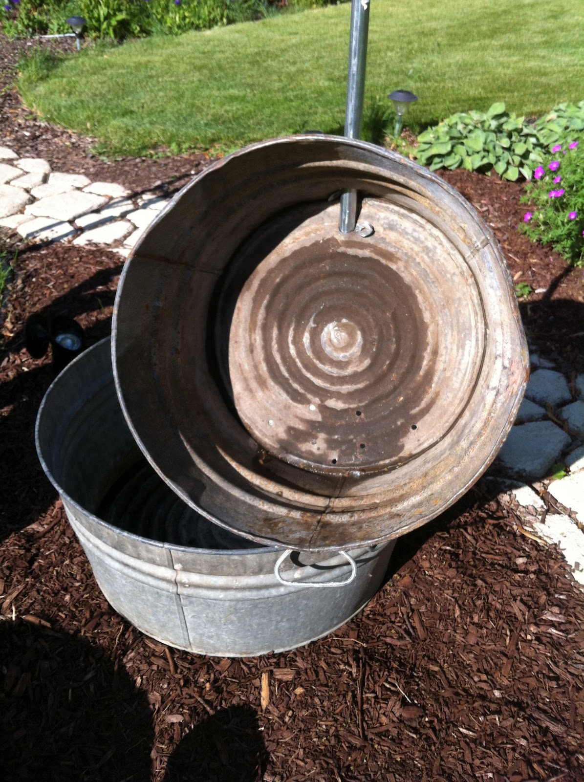 Our Garden Path Tipsy Buckets