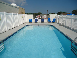 Pool surround covered by Duradek vinyl membrane