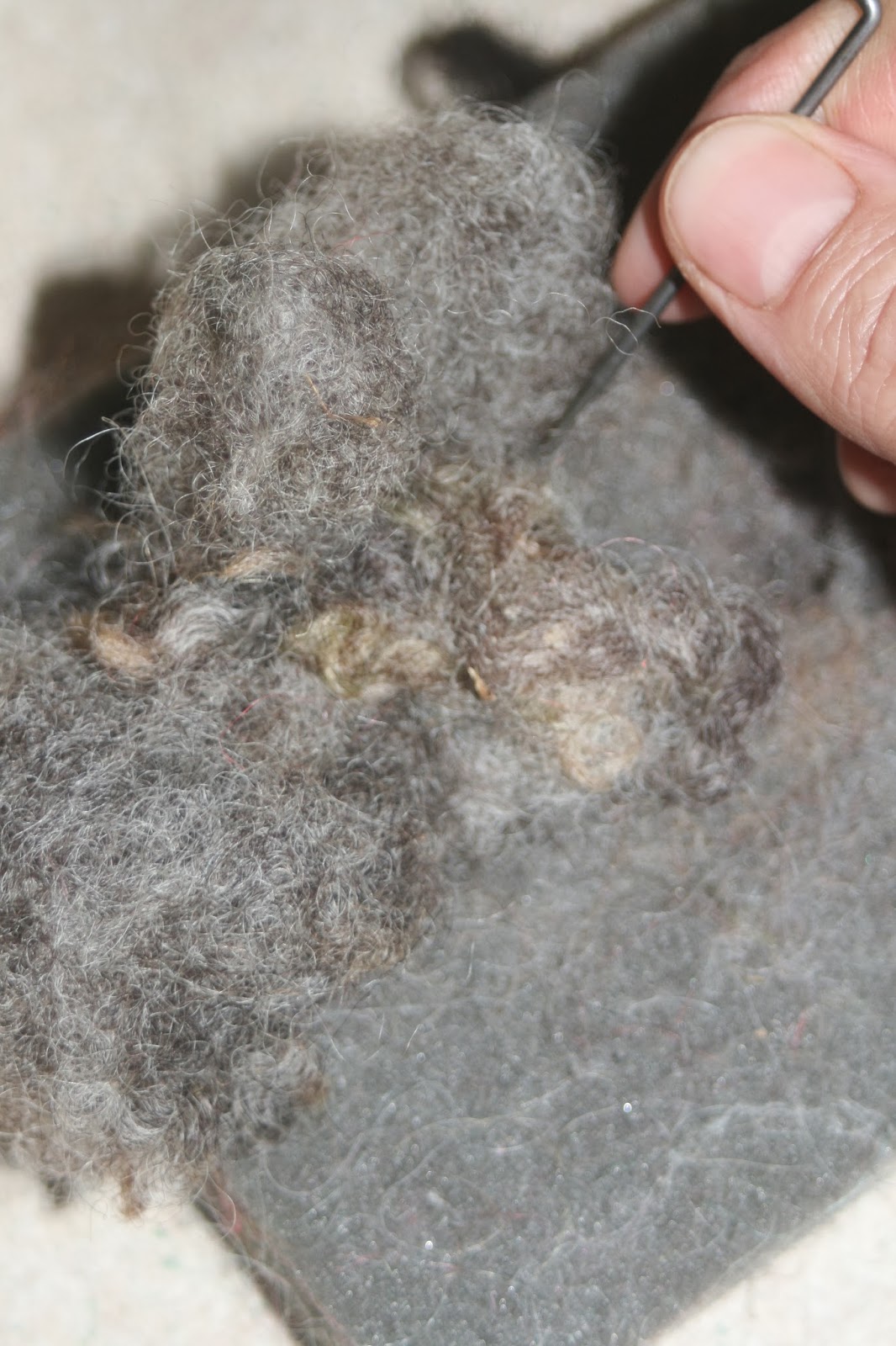 a needle felted mousy friend. June Cleaver in yoga pants