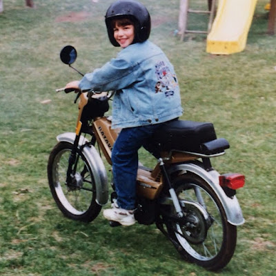 The crazy thing is that I actually remember the day this was taken..oh some 20 years ago.  The first time I ripped around on two wheels leaving the sweet smell of burned gasoline in my wake.  This was a pretty neat Batavus moped my dad had for a short time one summer.  He went and sold it for $50 to a kid down the street at the end of the season.  After a little research I'm almost certain this was a 1983 Batavus Gold  equipped with a 48 cc Laura Engine.  instagram 