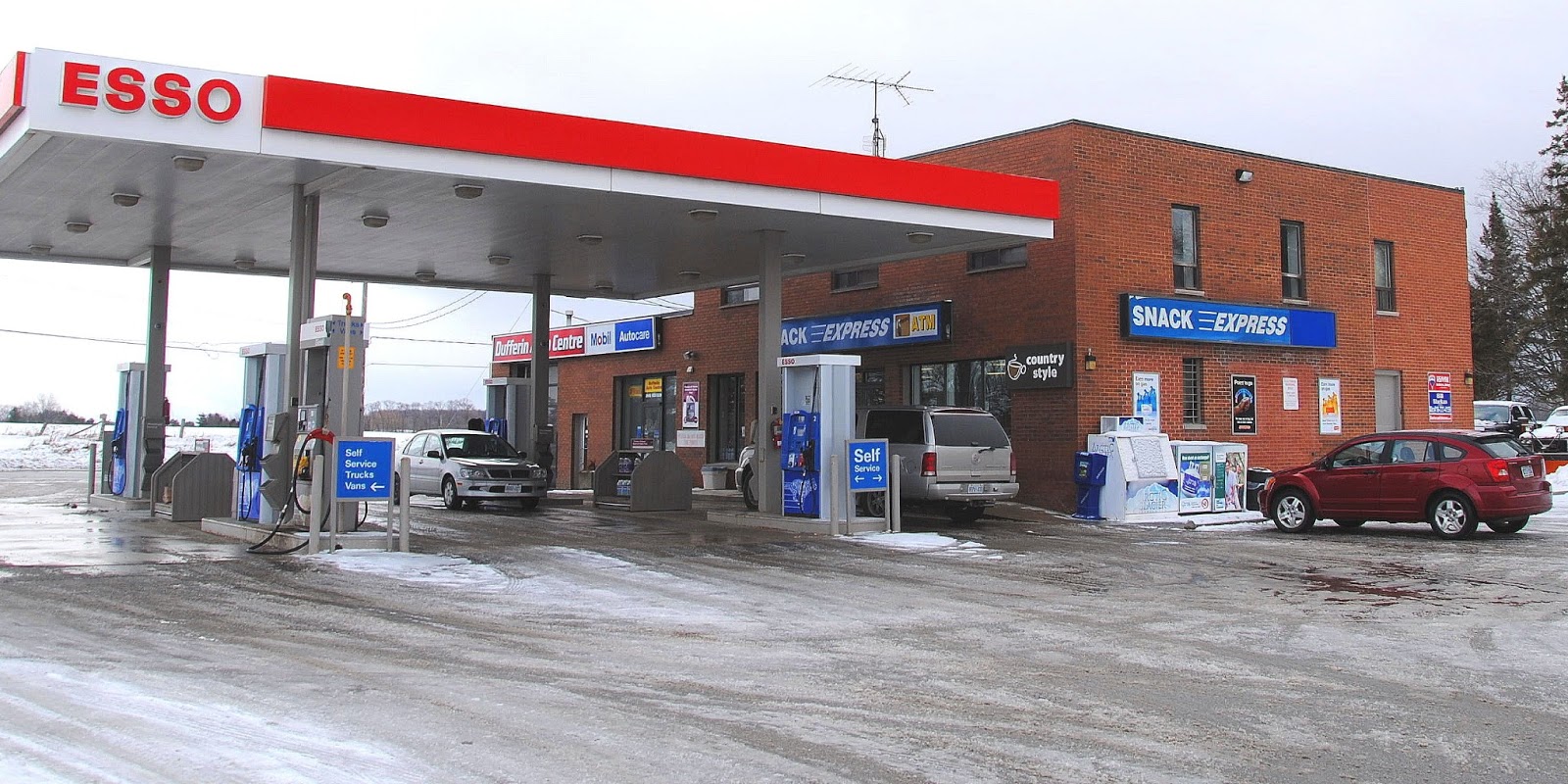 CAMERA ON KING McBride's Esso Service Dufferin and King Rd.