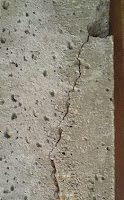 Cracked Concrete Fence Post