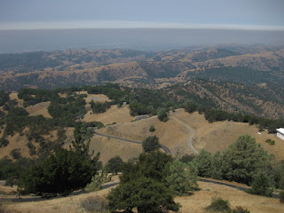 Layer of gray smoke hangs over the valley, view from summit of Mt. Hamilton, San Jose, California