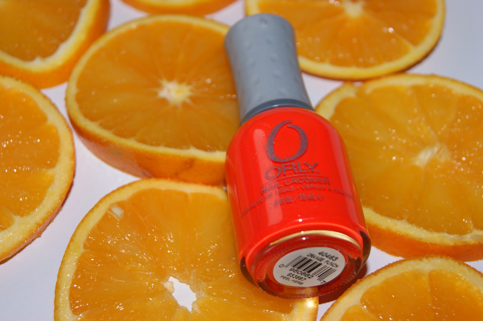 10. Orly Nail Lacquer in "Orange Punch" - wide 1