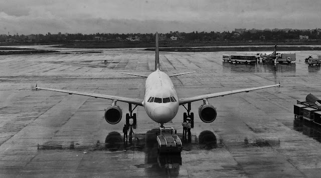 A wet day at the airport |Panasonic G1 | Lumix 14-45mm Vario | Conversion to B&W on Lightroom and Nik Silver Efex Pro