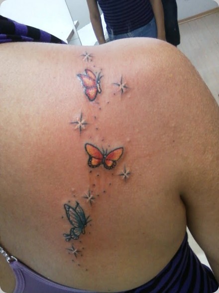Featured image of post Tatuagens Borboletas Nas Costas Tatuagem colorida de borboleta nas costas