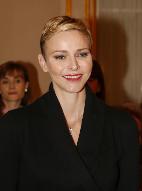 Prince Albert II of Monaco and Princess Charlene of Monaco attends parcels distribution at the Monaco Red Cross headquarters 