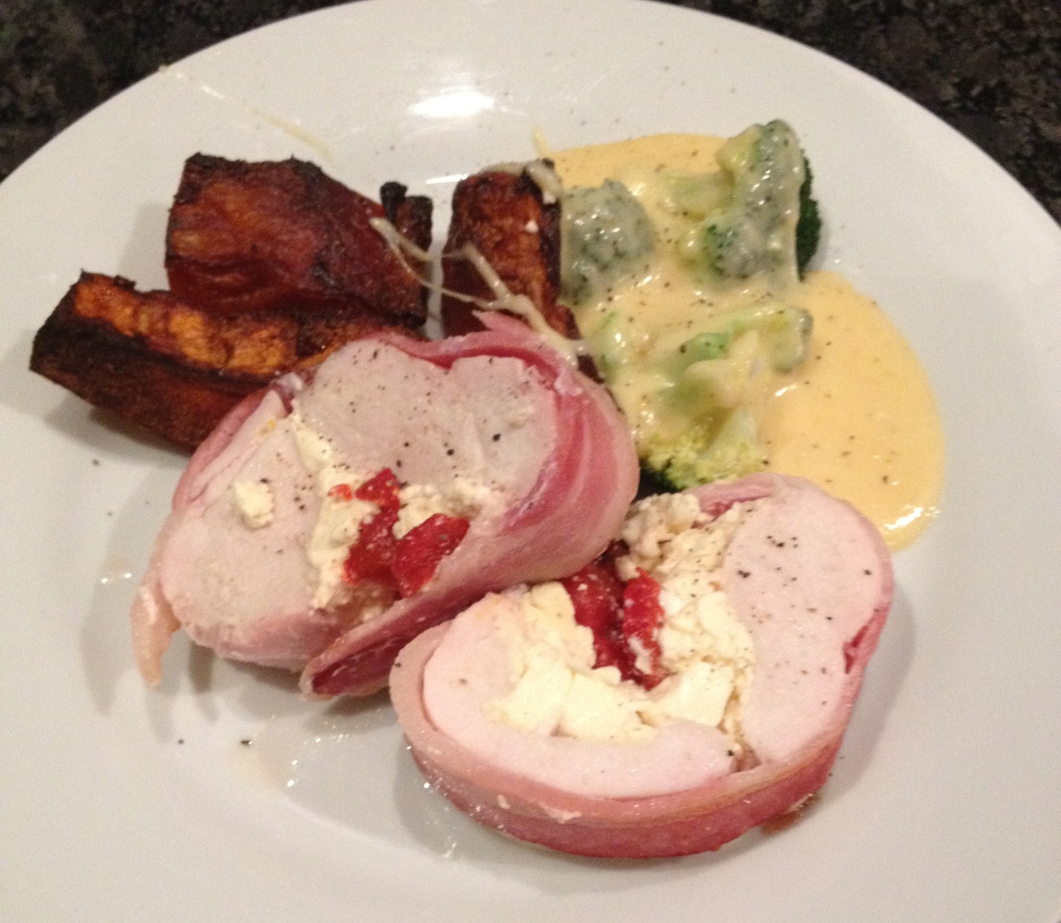 Bacon wrapped chicken, stuffed with feta and roasted red peppers