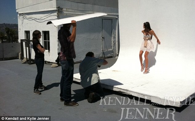 Kendall Jenner dazzles in a backless silver gown in new modelling shoot