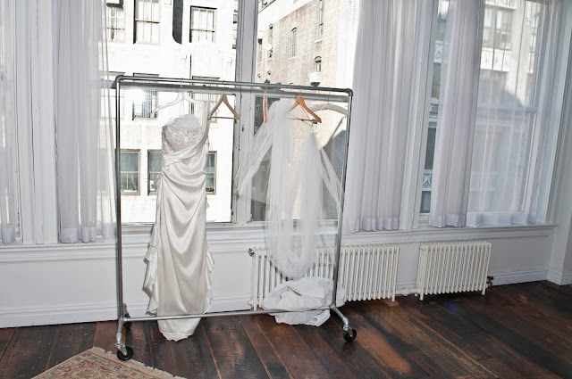 A Model Wedding, wedding gown on hanger at Gary's Lofts.