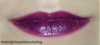 Initial application of Lime Crime Poisonberry lipstick over lips filled in with Urban Decay 24/7 Glide-On Lip Pencil in Envious