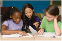 NAMC montessori classroom teaching civics girls writing
