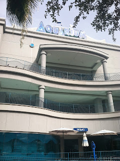 a building with a sign on the top