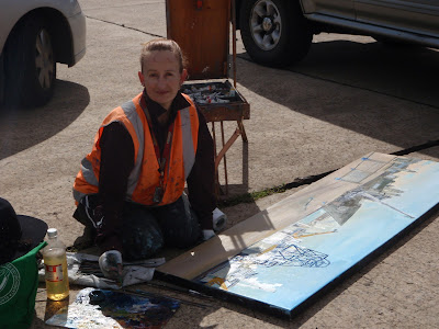 Jane Bennett industrial heritage artist painting ex HMAS Adelaide en plein air on Glebe Island Wharf