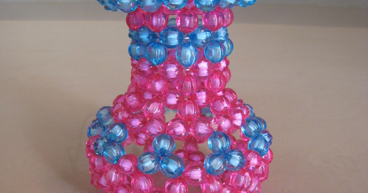Art acrylic crystal beaded flower vase.