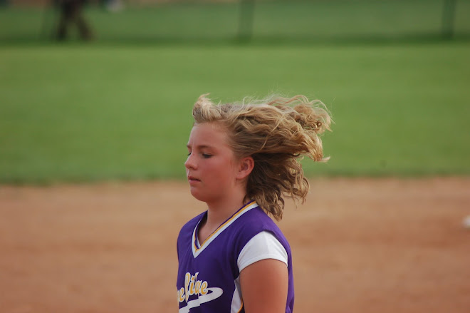 my sis playing softball