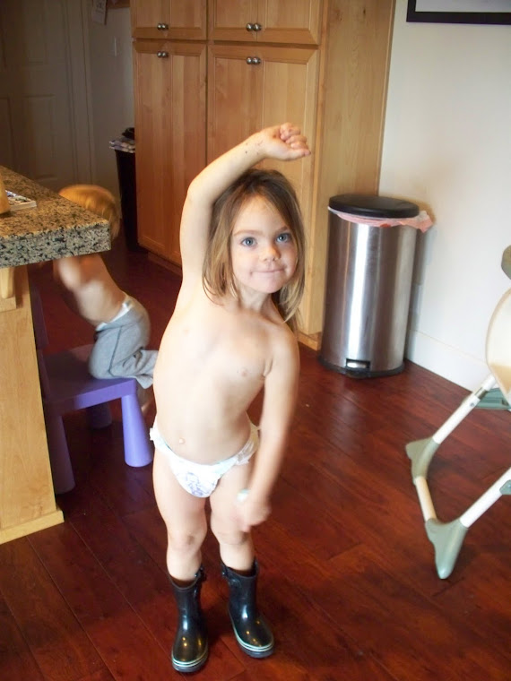 Ellie in a diaper and boots!