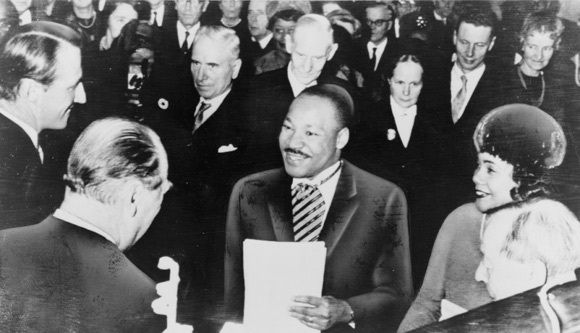 DR. MARTIN LUTHER KING RECEIVES THE NOBEL PEACE PRIZE