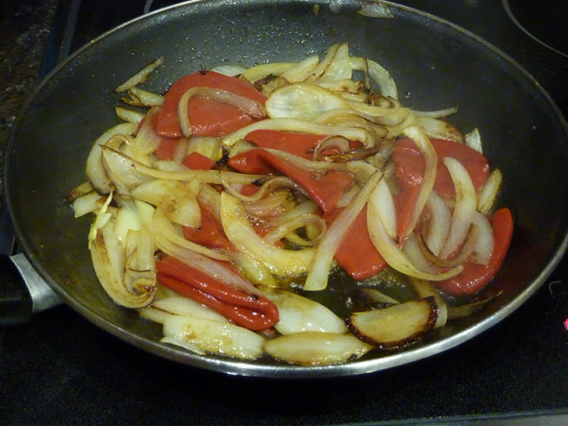 Cebola com pimentos refogados