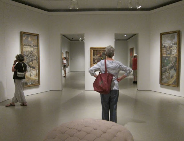 Woman in museum gallery