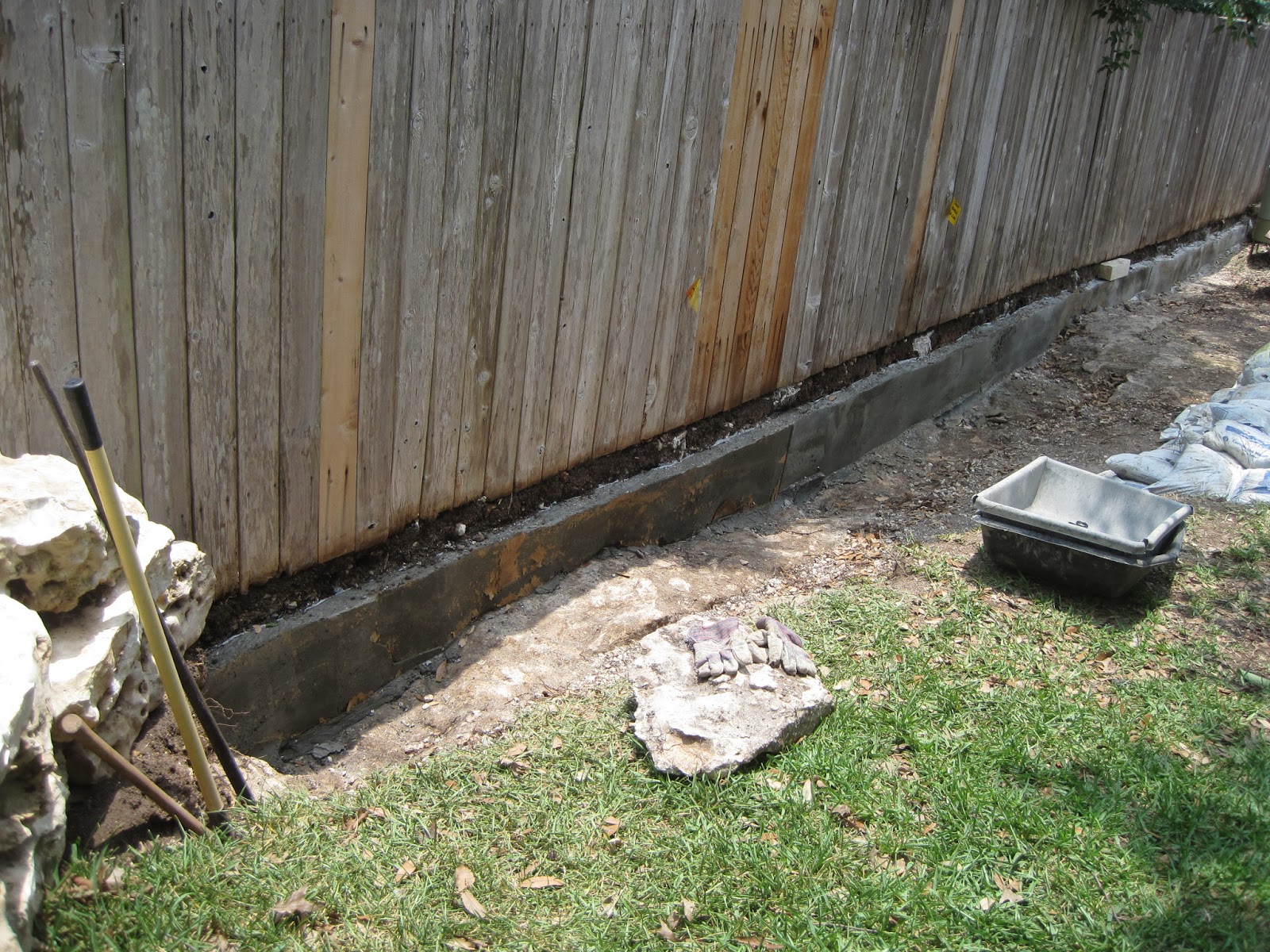House Remodelling Laying down the limestone blocks on top of the