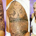 Veja a tattoo de Eminem nos braços