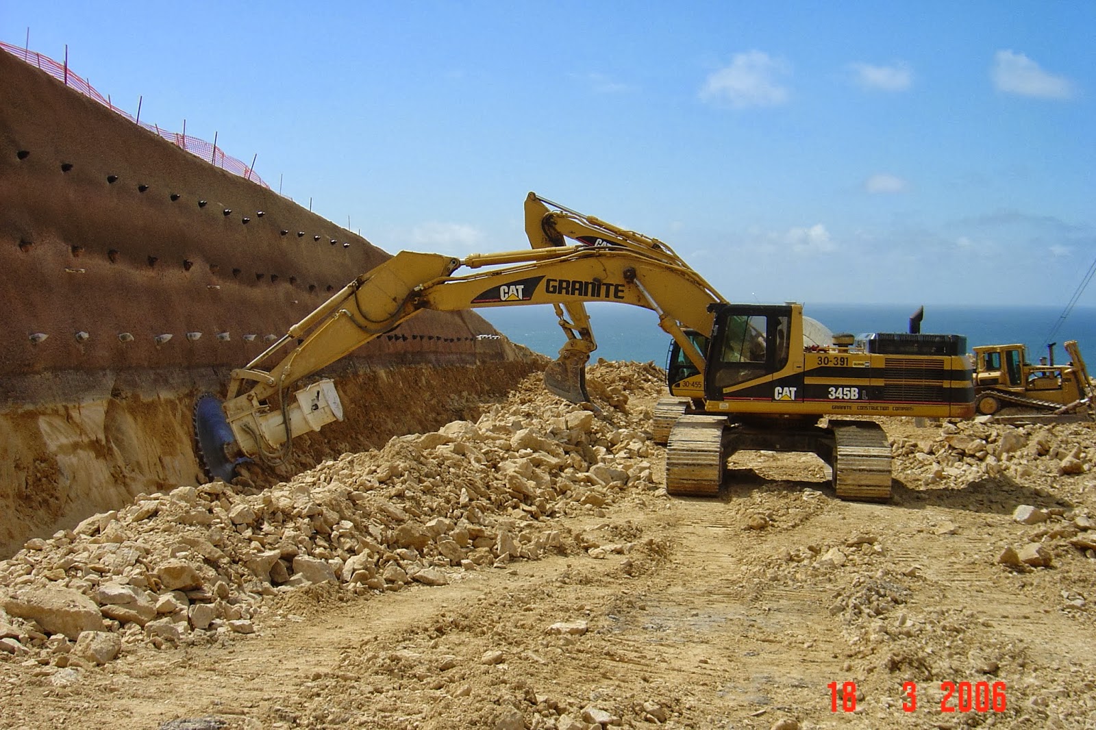 Excavator rock Saw Rock Tools cutting California