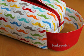 neceser "boxy pouch" con divertida y colorida tela con mostachos totalmente handmade por funkypatch