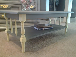 Cool grey coffee table w/ yellow accents $85