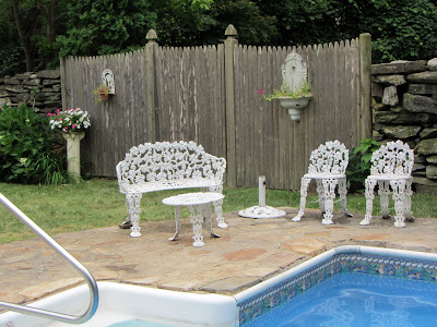 Victorian Cast Iron Garden Furniture on At The Near End Of The Pool Is This Victorian Cast Iron Set Of Chairs