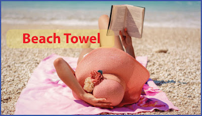 Woman using a Beach Towel