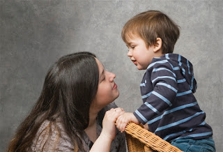 Mother talking to boy at eye level mother, parent, child, eye-level, cooperative kids, love limits lessons