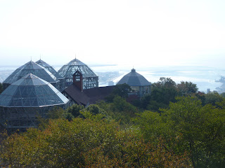 View from above of the Nunobiki herb garden glasshouses, ocean is visible in the distance. At Kobe