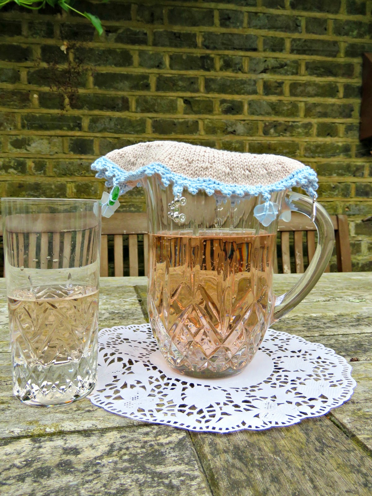 just saying Jug cover with sea glass beads