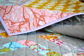 Quilt with solid binding