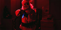 Santa with a flamethrower from silent night movie 2012