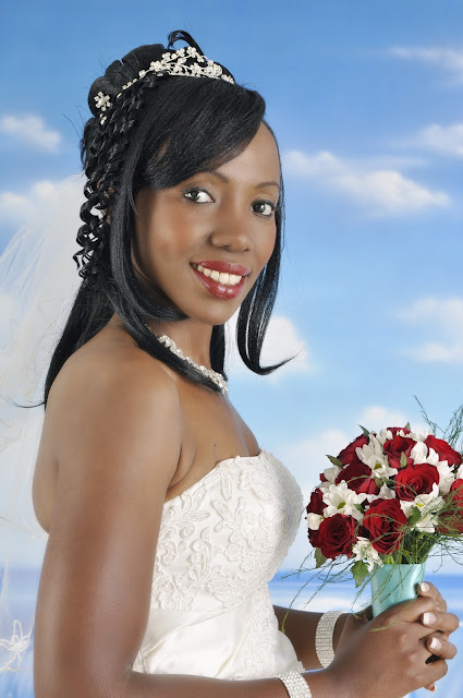 Dressed by Wedding Bells Irene wore a hip fitted draped bridal satin