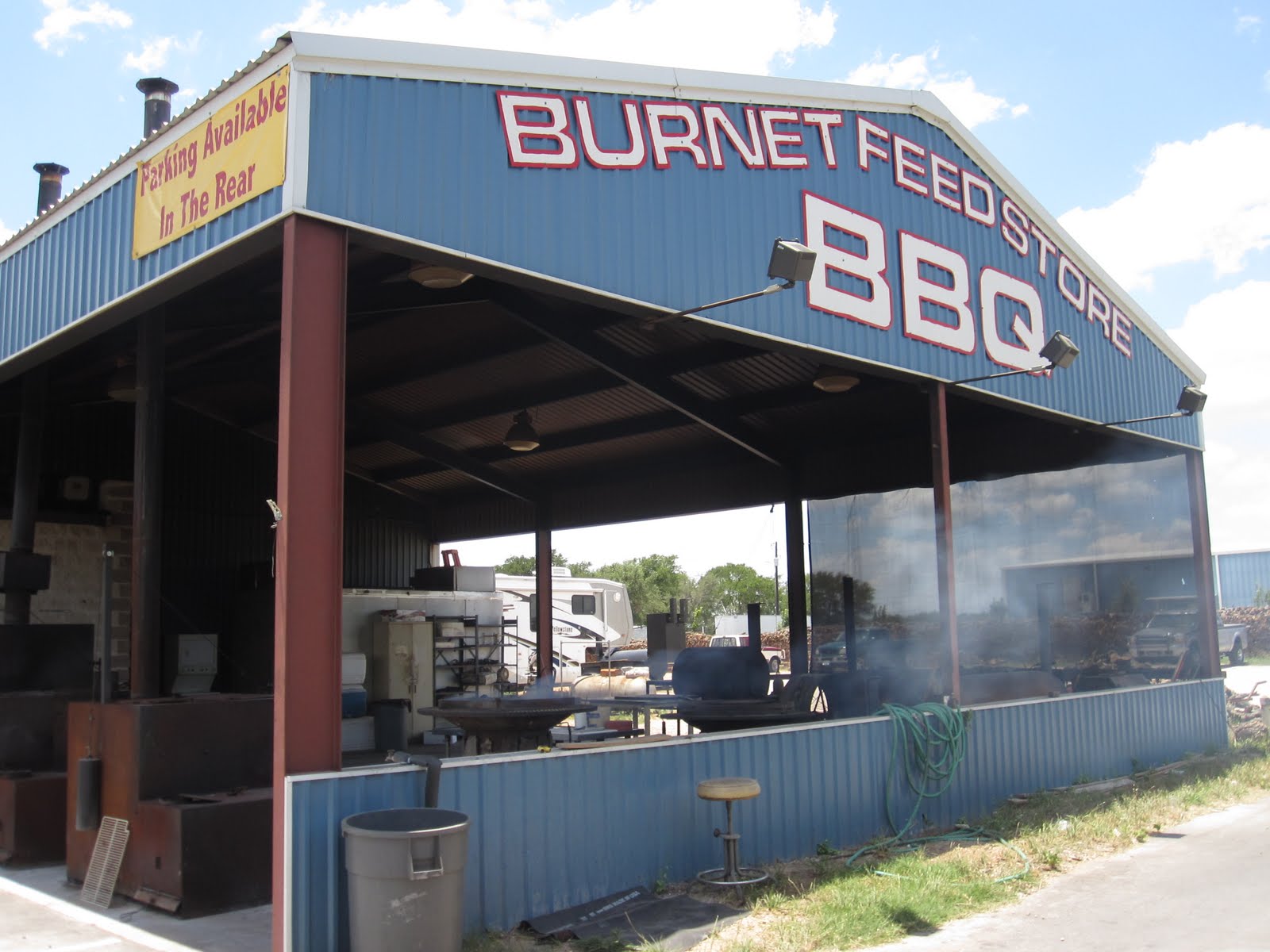Man Up Tales of Texas BBQ™ The pit at Feed Store BBQ TX)