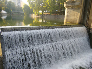 A small dam across the Ljubljanica river in Ljubljana.