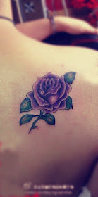 purple rose tattoo design on the back