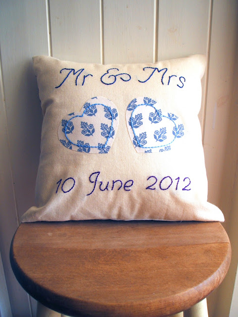 personalised handmade wedding cushion with vintage fabric hearts and embroidery