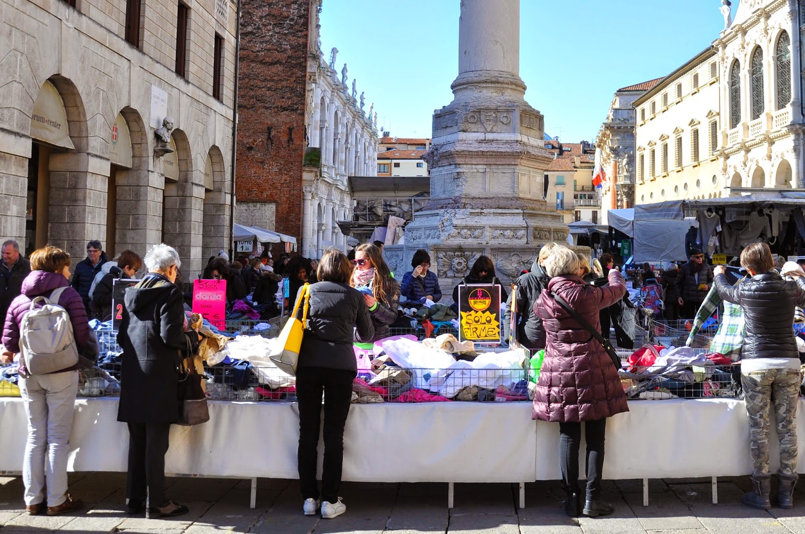 Picking bargains at the Thursday market in Vicenza, Italy