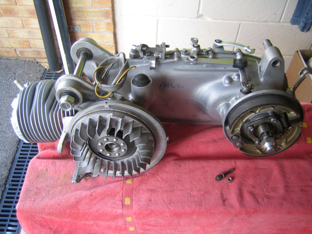 Lambretta Restoration Engine rebuilt. Adding cowlings, carb and exhaust downpipe