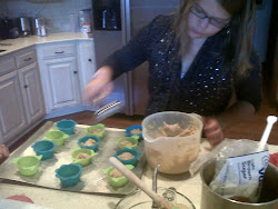 Kylie fills the muffin cups with batter.