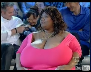Meet The Woman With The World's Largest Boobs, Her Boobs Heavier 
Than Average 4-Year-Old Child