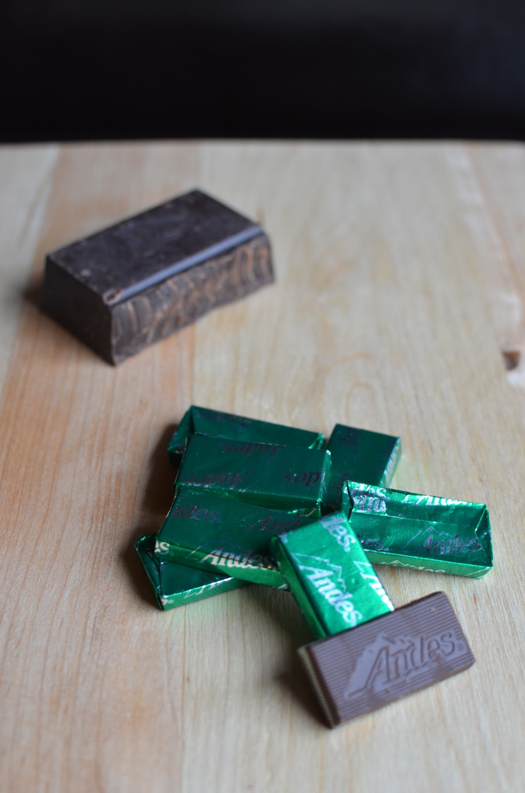 Playing with Flour Peppermint brownies topped with candy cane and dark