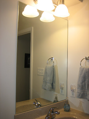 Elizabeth & Co.: Framing Bathroom Mirrors