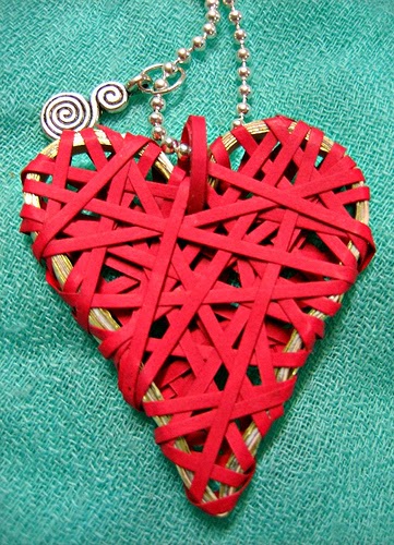 http://www.allthingspaper.net/2013/01/wrapped-paper-hearts-tutorial.html