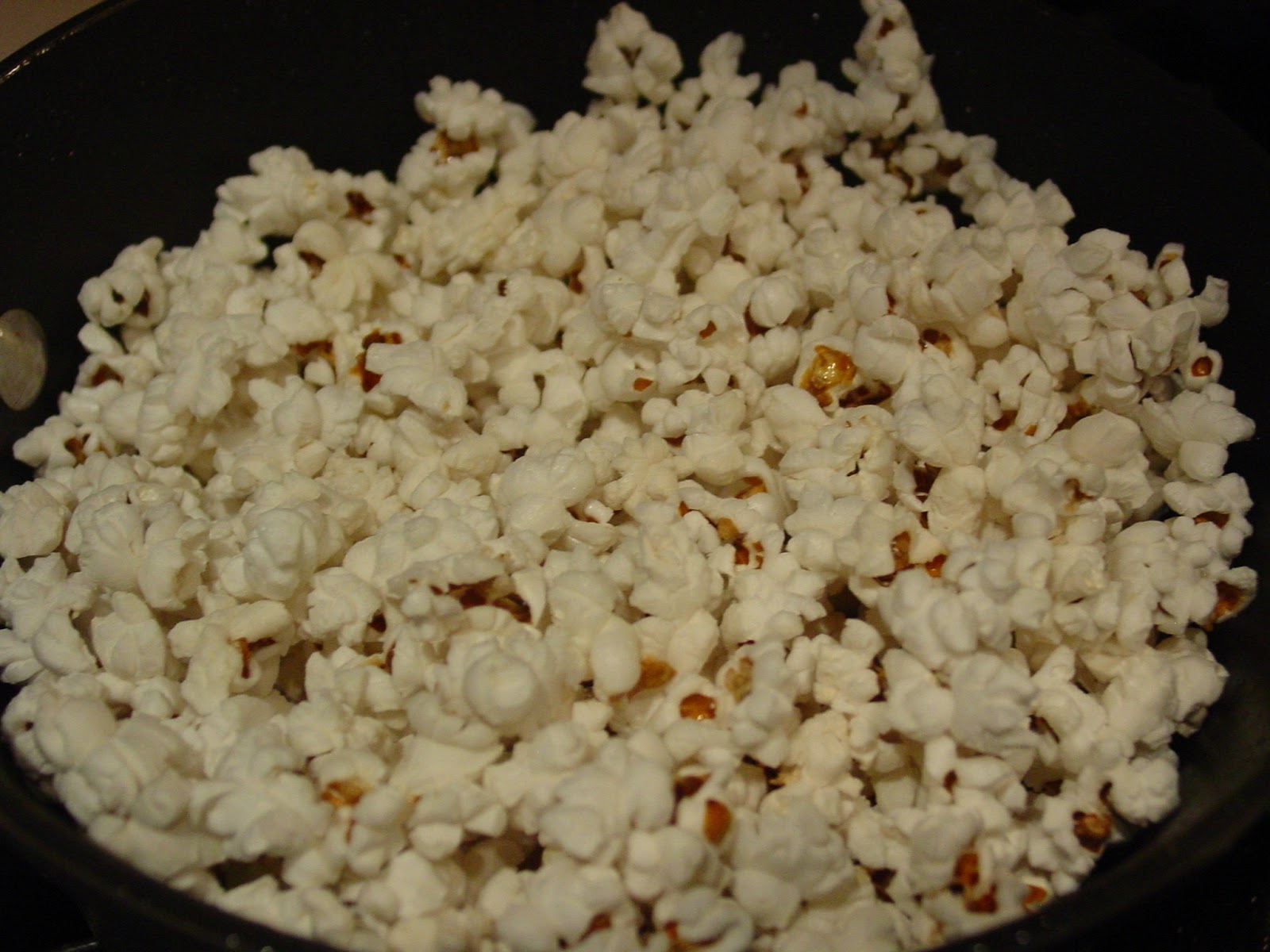 The Dirty Floor Popcorn on the Stove